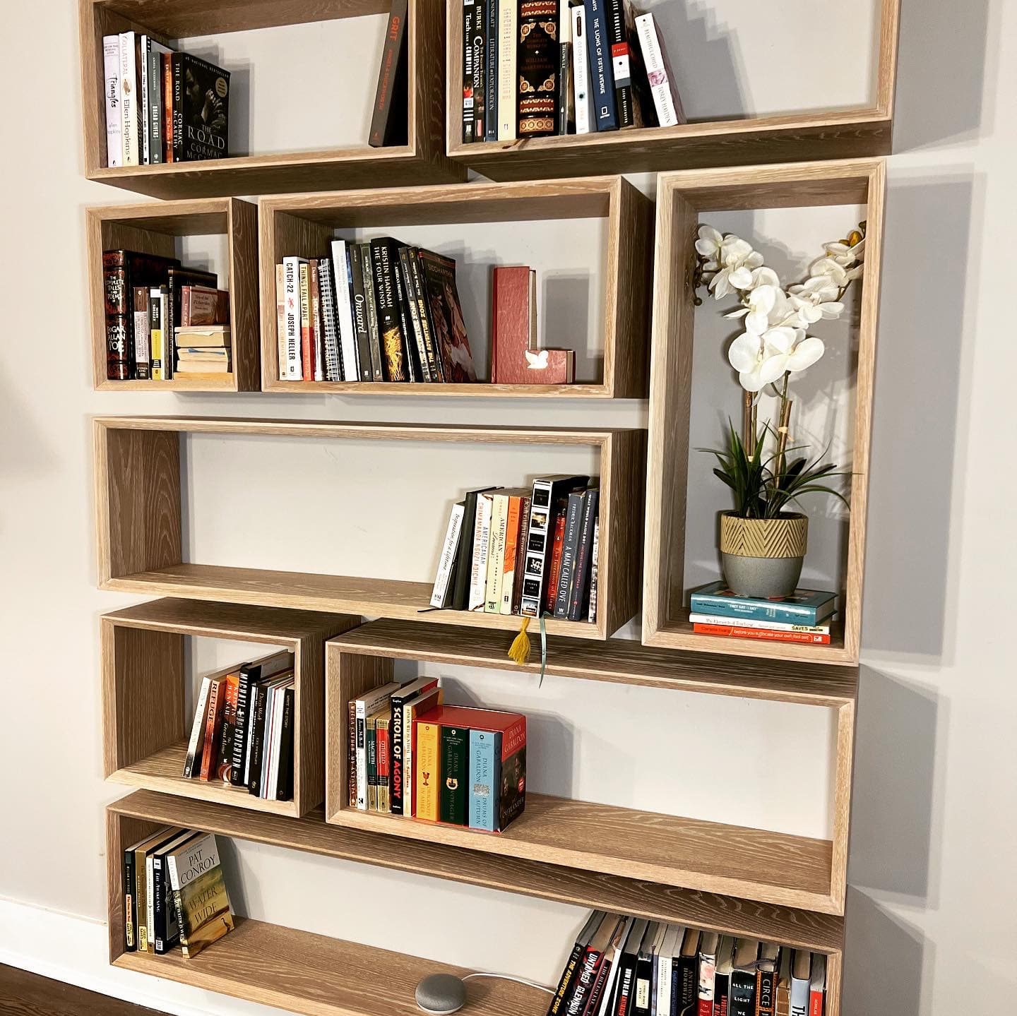 Geometric oak modular bookshelf wall unit