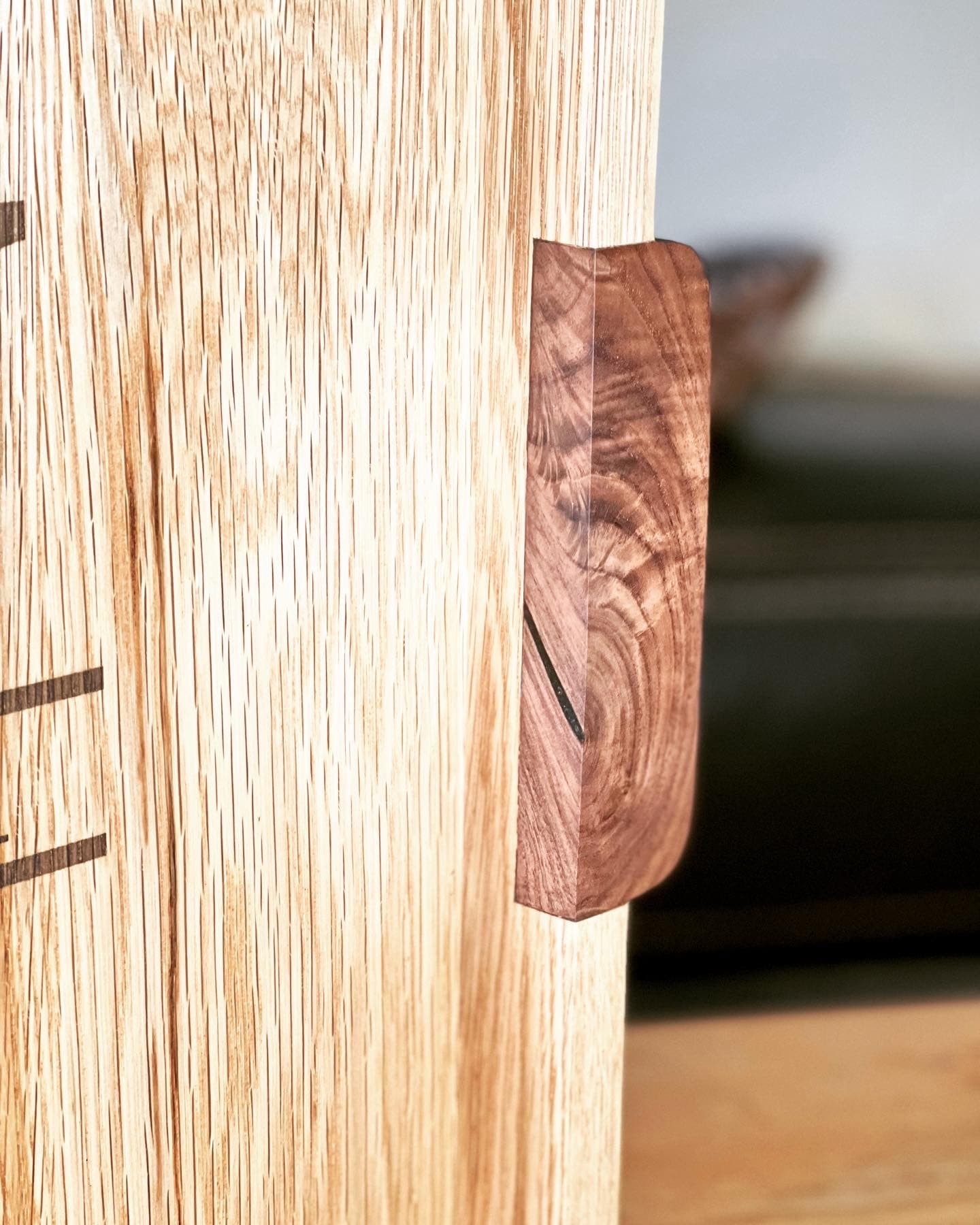 Close-up of walnut peg joinery detail